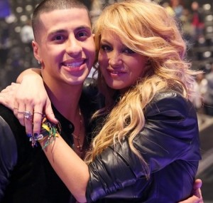 Contestant Carlito Olivero with Coach Paulina Rubio