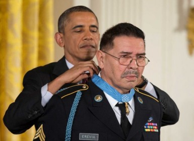 President Barack Obama awards Army Spc. Santiago Erevia the Medal of Honor during a ceremony in the East Room of the White House.