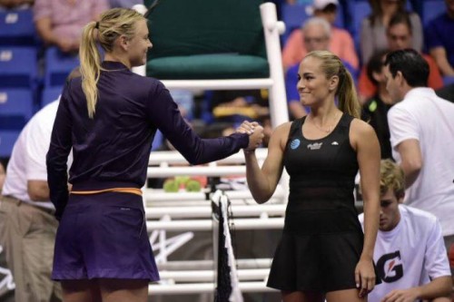 maria-sharapova-gets-beaten-by-monica-puig-in-an-exhibition-match